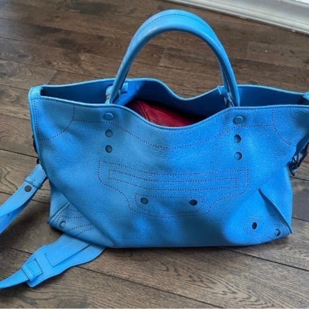 Balenciaga BlackOut city matte calfskin shoulder bag with perforated trim.